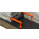 Connolly expansion joint system installed between two concrete slab sections with dowels and orange sleeves